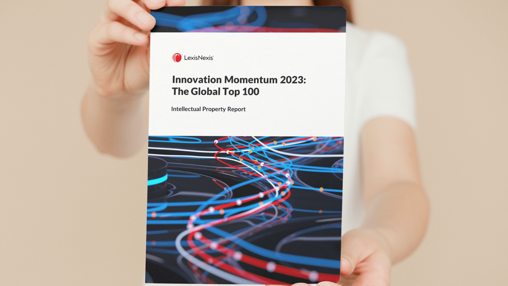 Innovation Momentum 2023 Person Holding Report